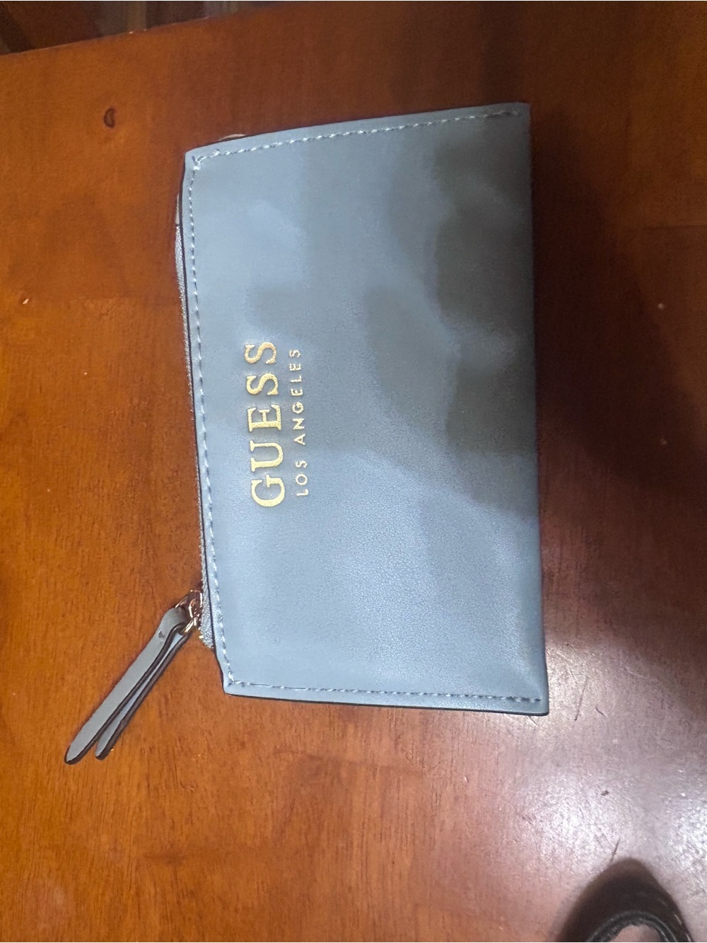 GUESS Light Blue Women's Zip Card Holder with Gold Logo